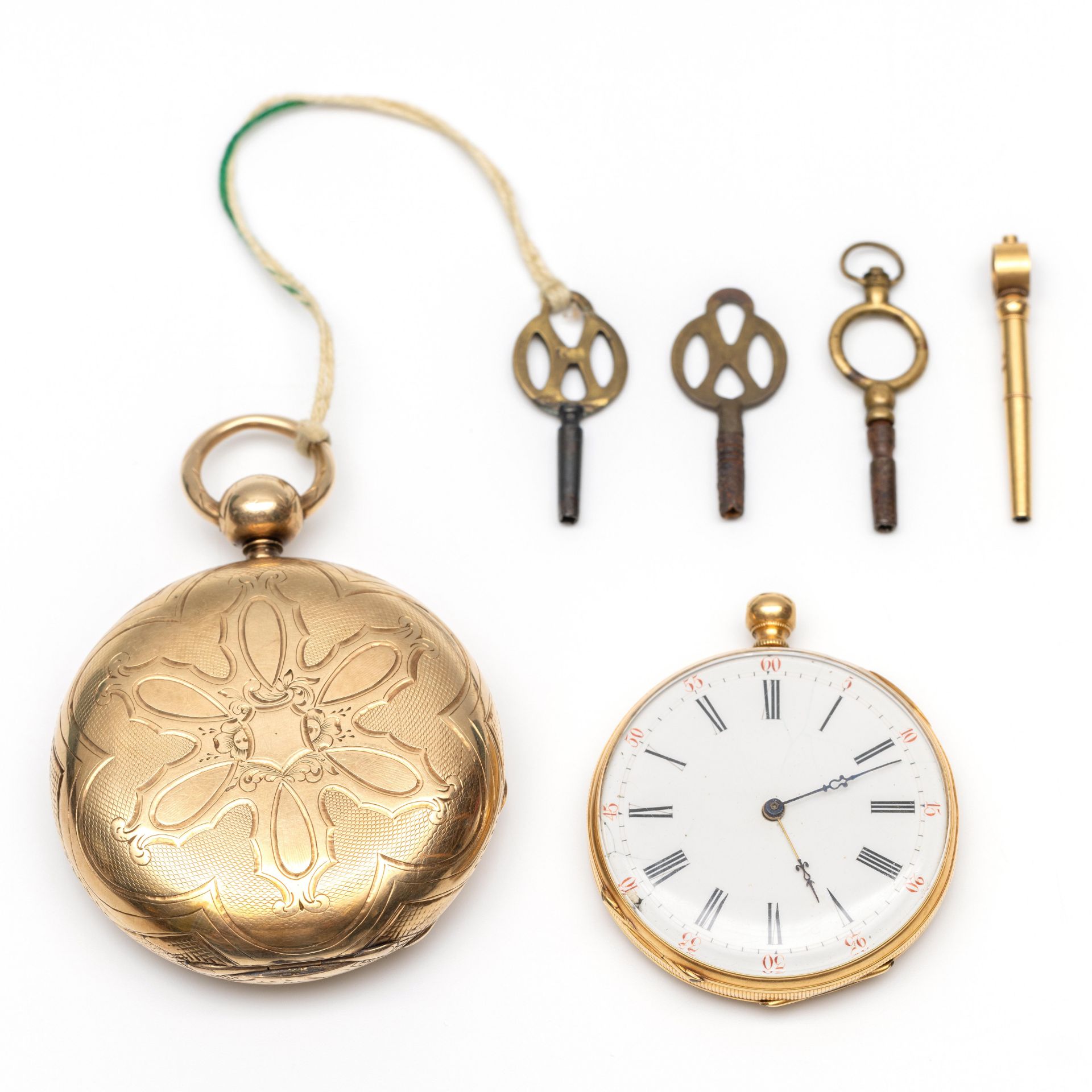 Twee gouden sleutelhorloges.