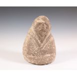A stone anthropomorphic figure, possibly Archaic Period.