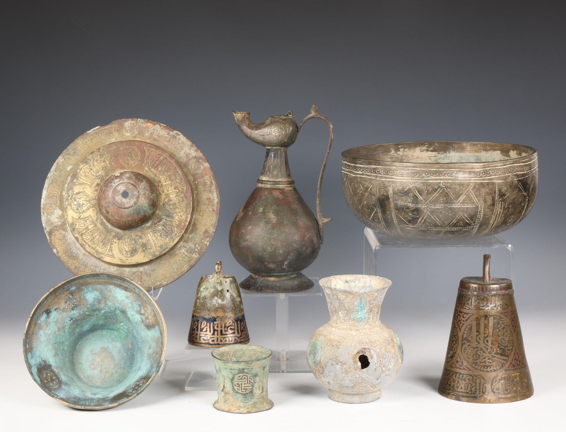 Near Eastern, a collection of eight bronze objects, Khorasan, 11th century and later;