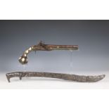 A Eastern style flintlock pistol and a iron sword