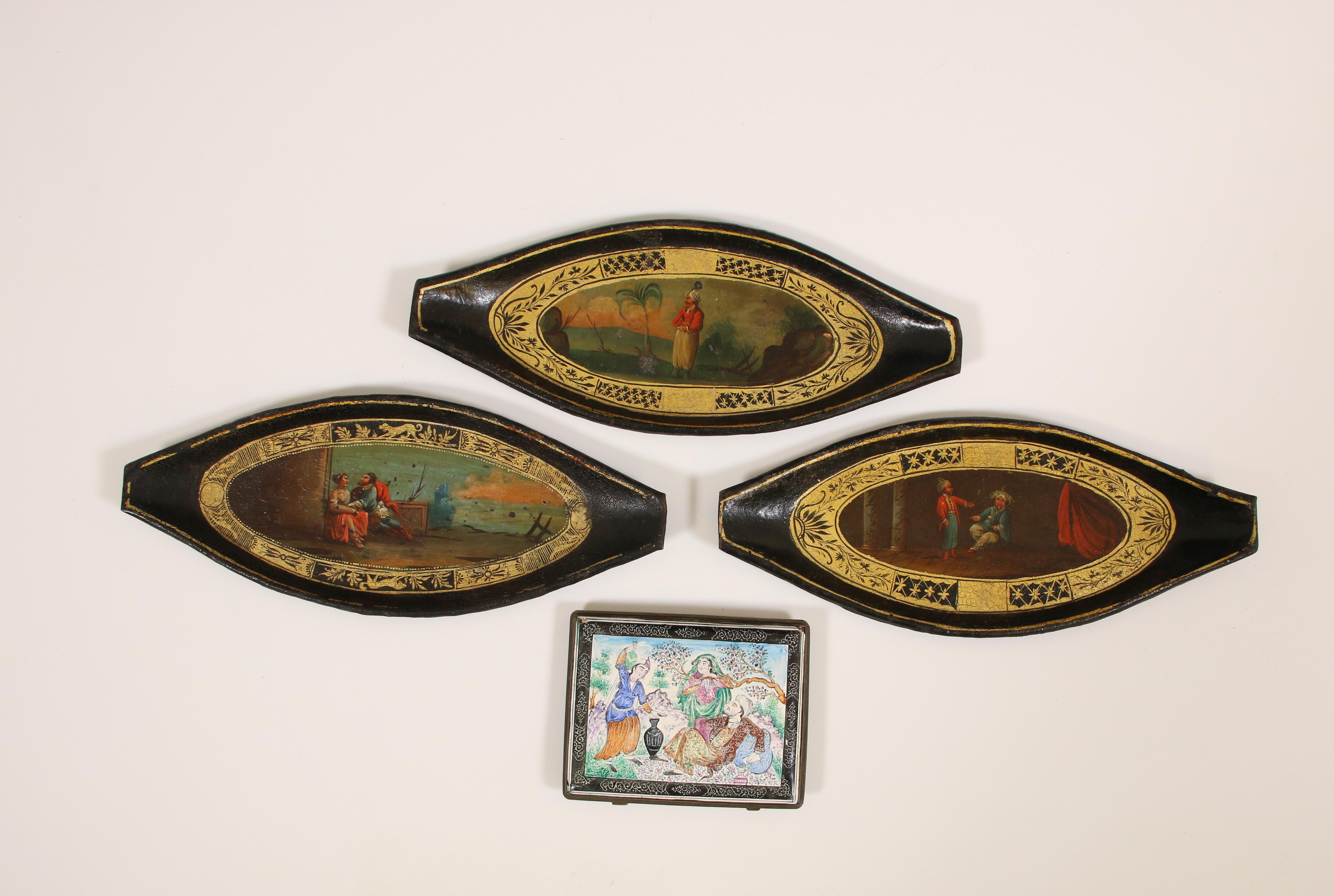 Persia, three lacquered and painted tin oval dishes, 19th century