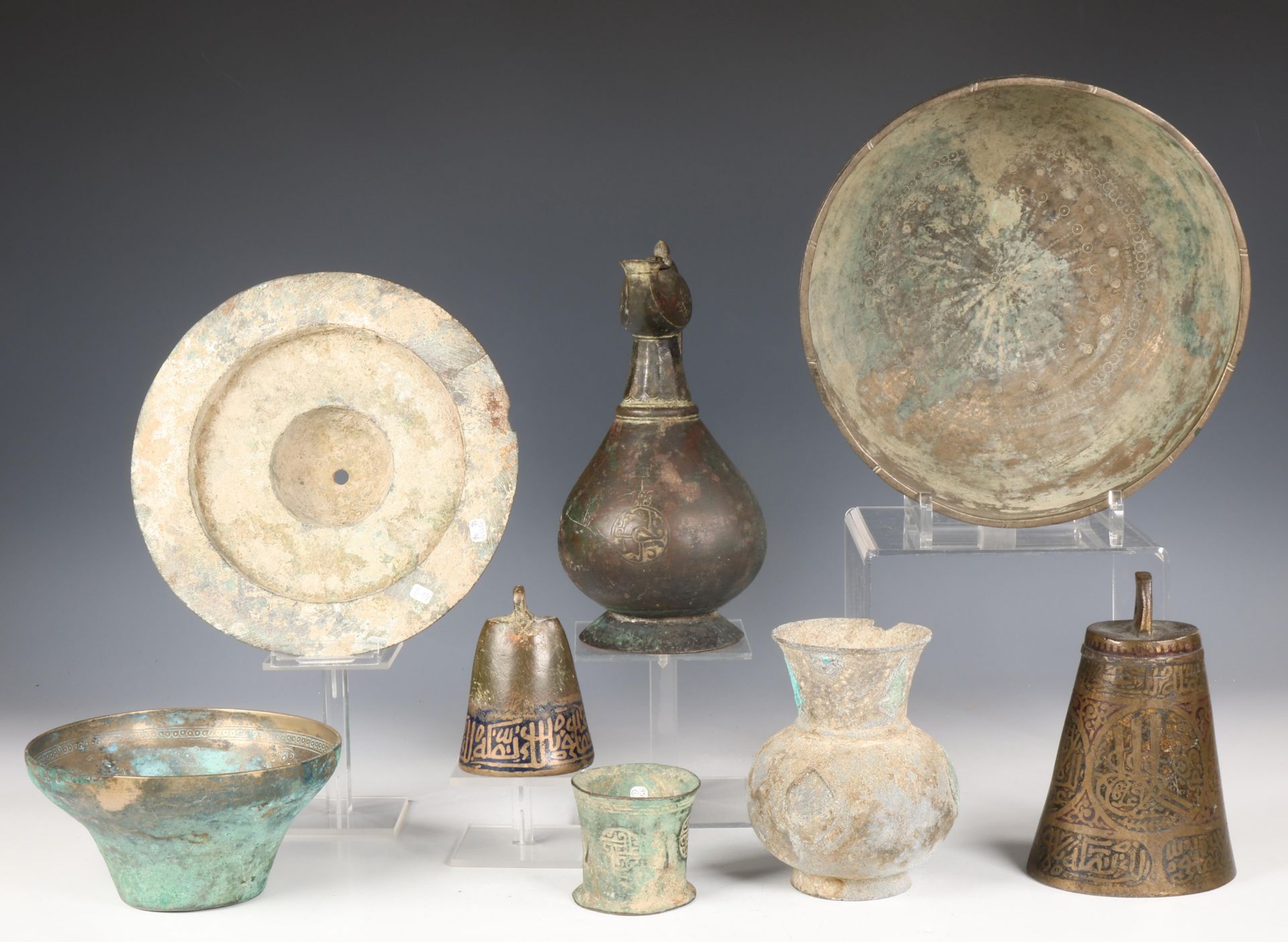 Near Eastern, a collection of eight bronze objects, Khorasan, 11th century and later; - Image 2 of 2