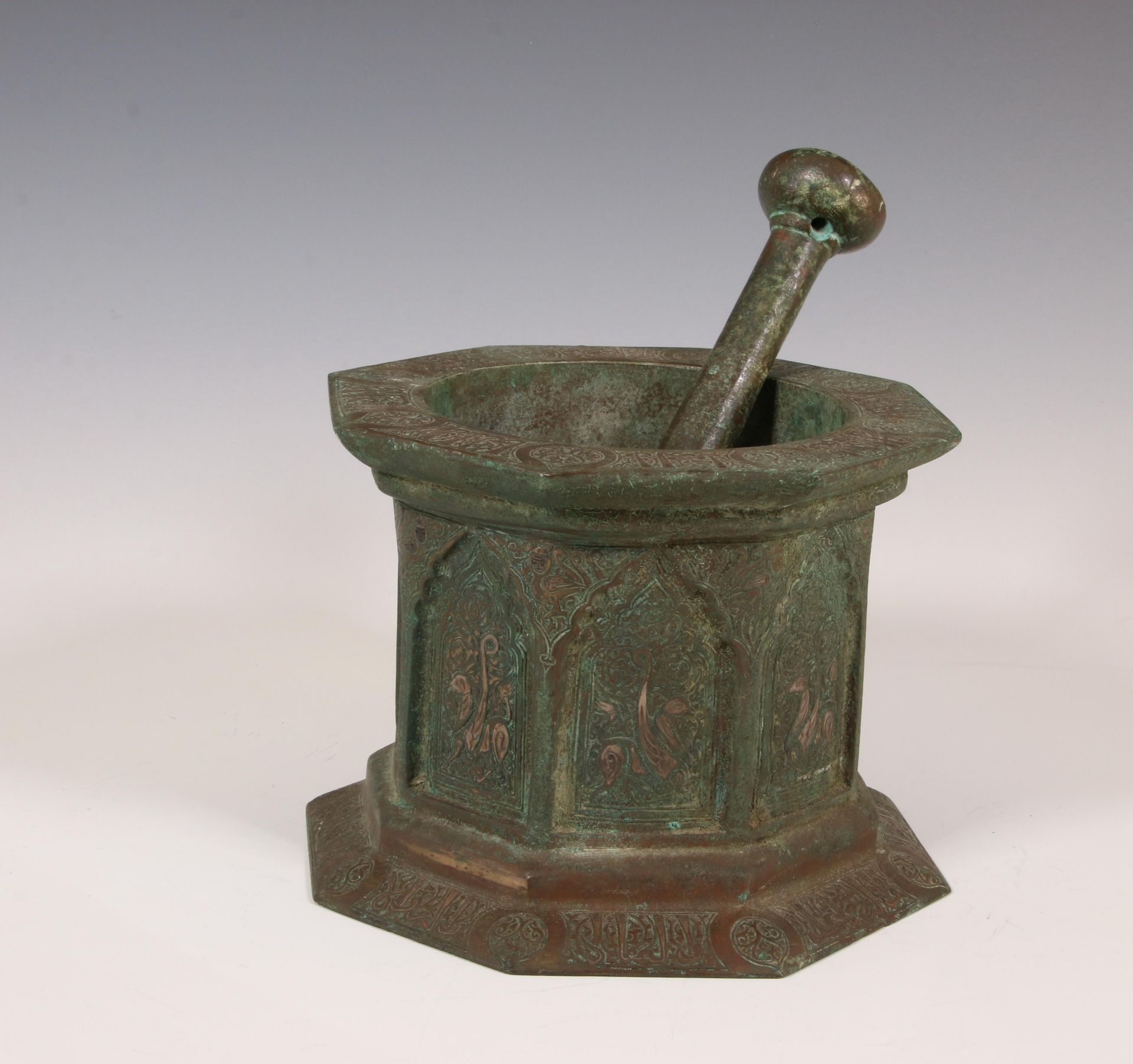 Iran, a bronze antique mortar and pestle in Khorassan style, 19th century