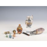 Phoenician style glass face beads, two style glass flask and various glass beads.