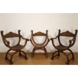 Twee notenhouten en één eikenhouten Dagobert fauteuils, circa 1900,