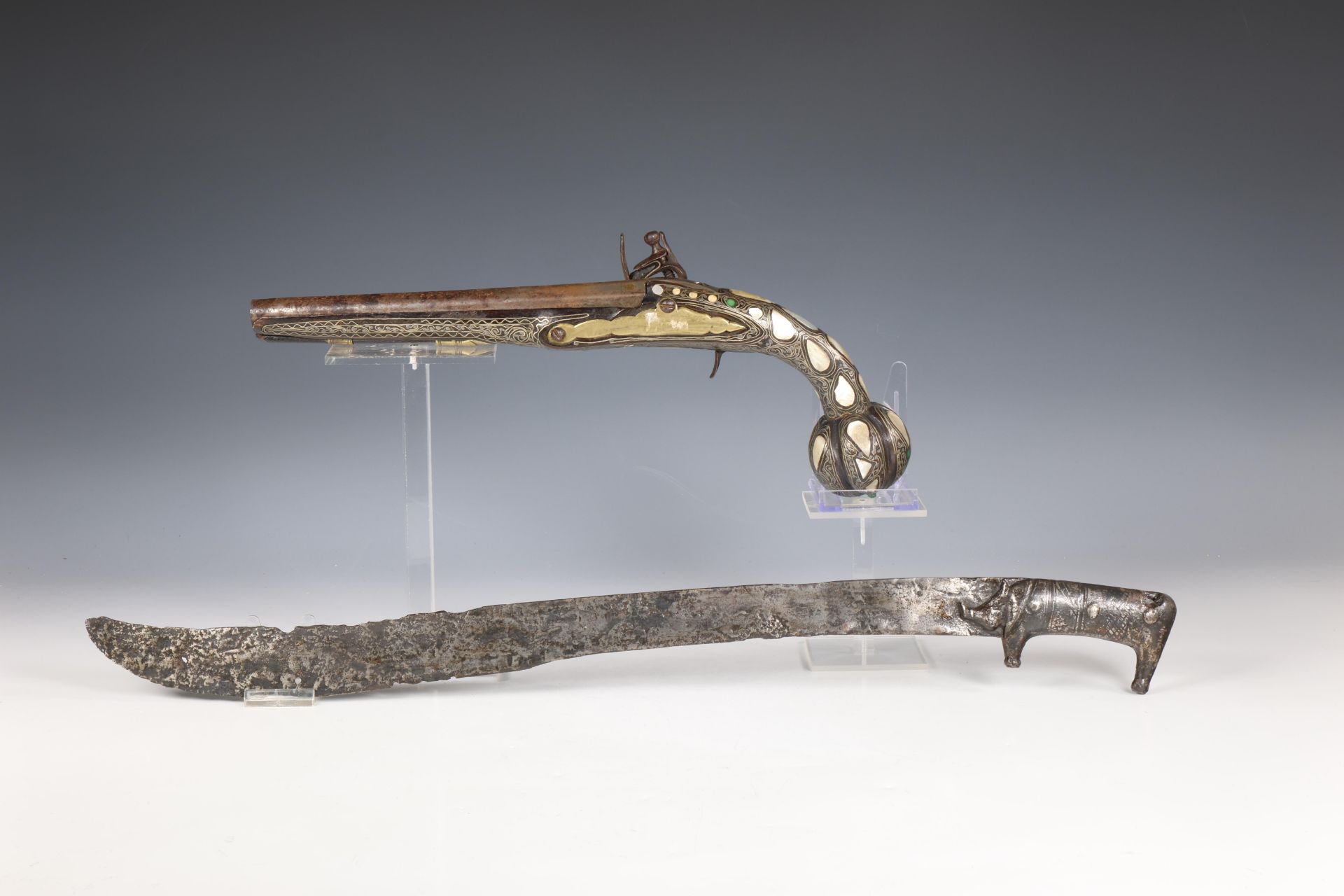 A Eastern style flintlock pistol and a iron sword - Image 2 of 2