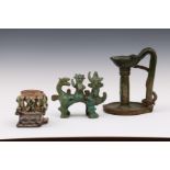 Iran, a green ceramic oil lamp, a mythological figure group and a faience tazza, 19th century and la