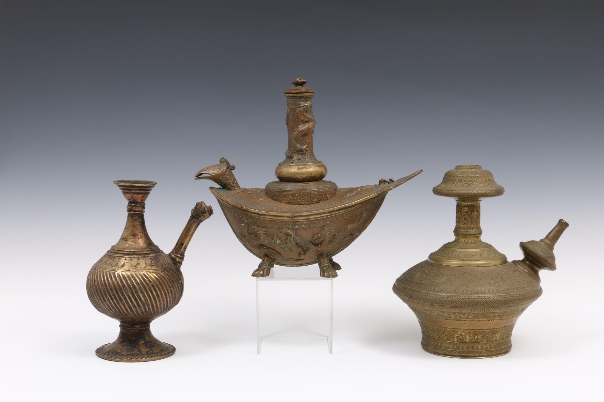 Near Eastern, a bronze antique ewer, India, a brass gendhi and Sumatra, Padang, bronze gendhi, 20th - Image 2 of 2