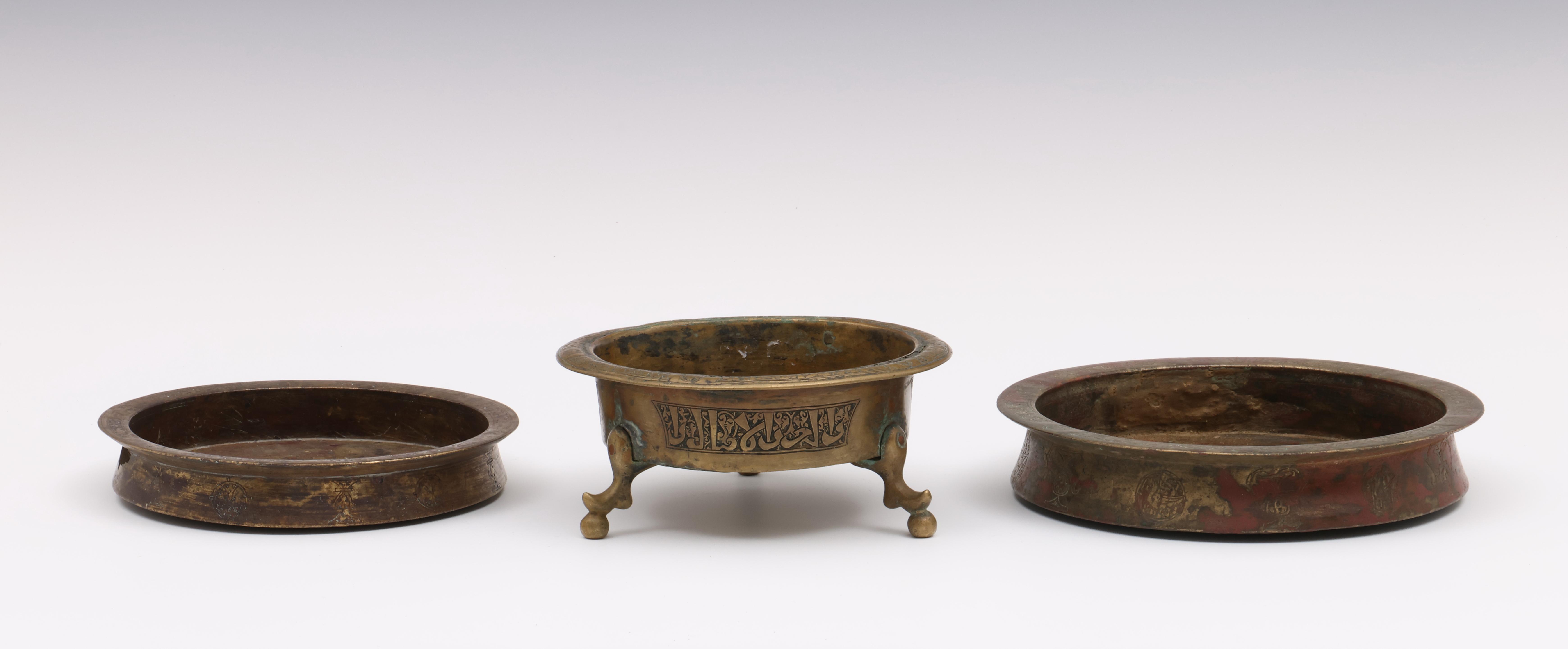 Near Eastern, Seljuk, three bronze dishes, 11th-13th century or later;