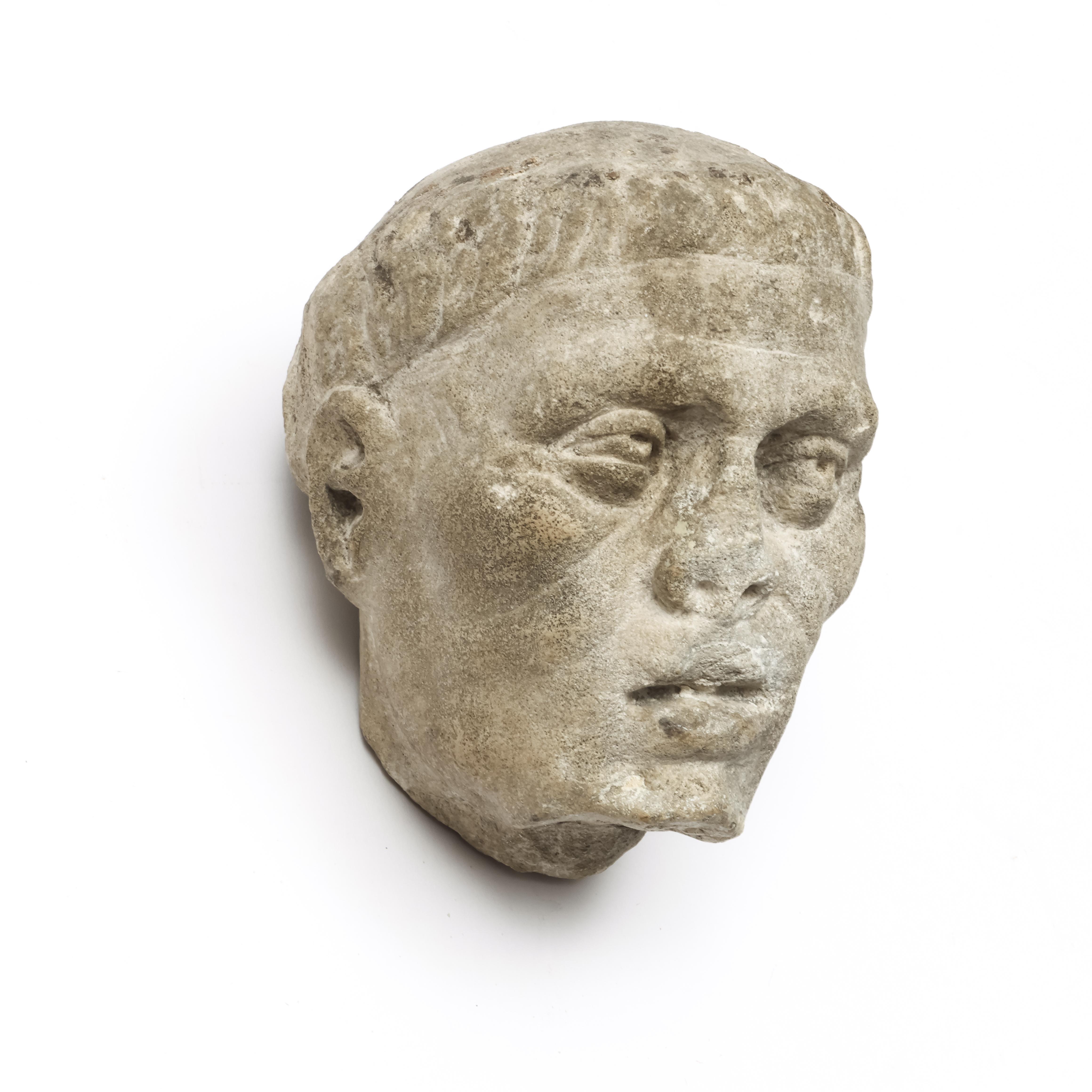 A marble male head. SALE ROOM NOTICE: PROBABLY OF A LATER DATE AND NOT ROMAN PERIOD - Image 6 of 6