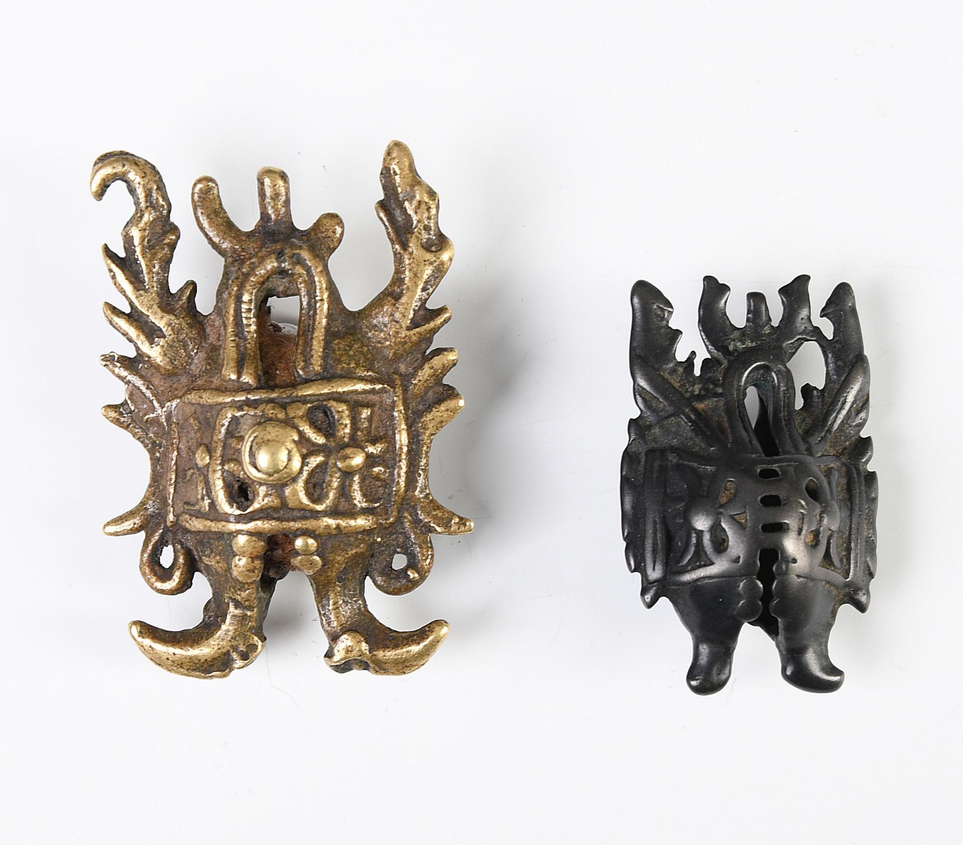 Central-Sulawesi, Toraja, two copper alloy amulets, taiganja, - Image 3 of 3