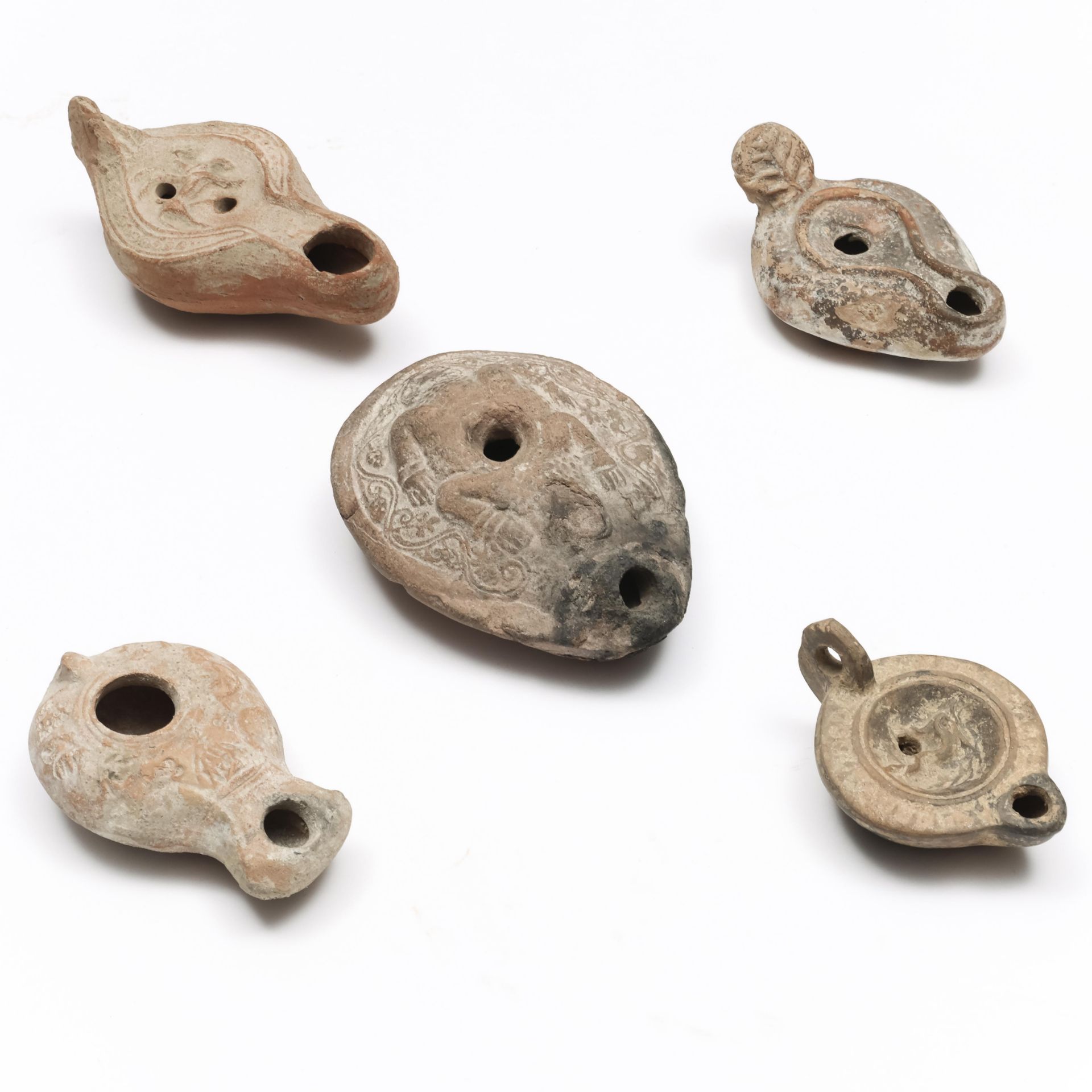 Five various terracotta oil lamps; Near Eastern and Roman. - Image 2 of 2