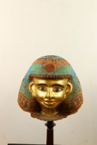 A decorative painted mummy mask