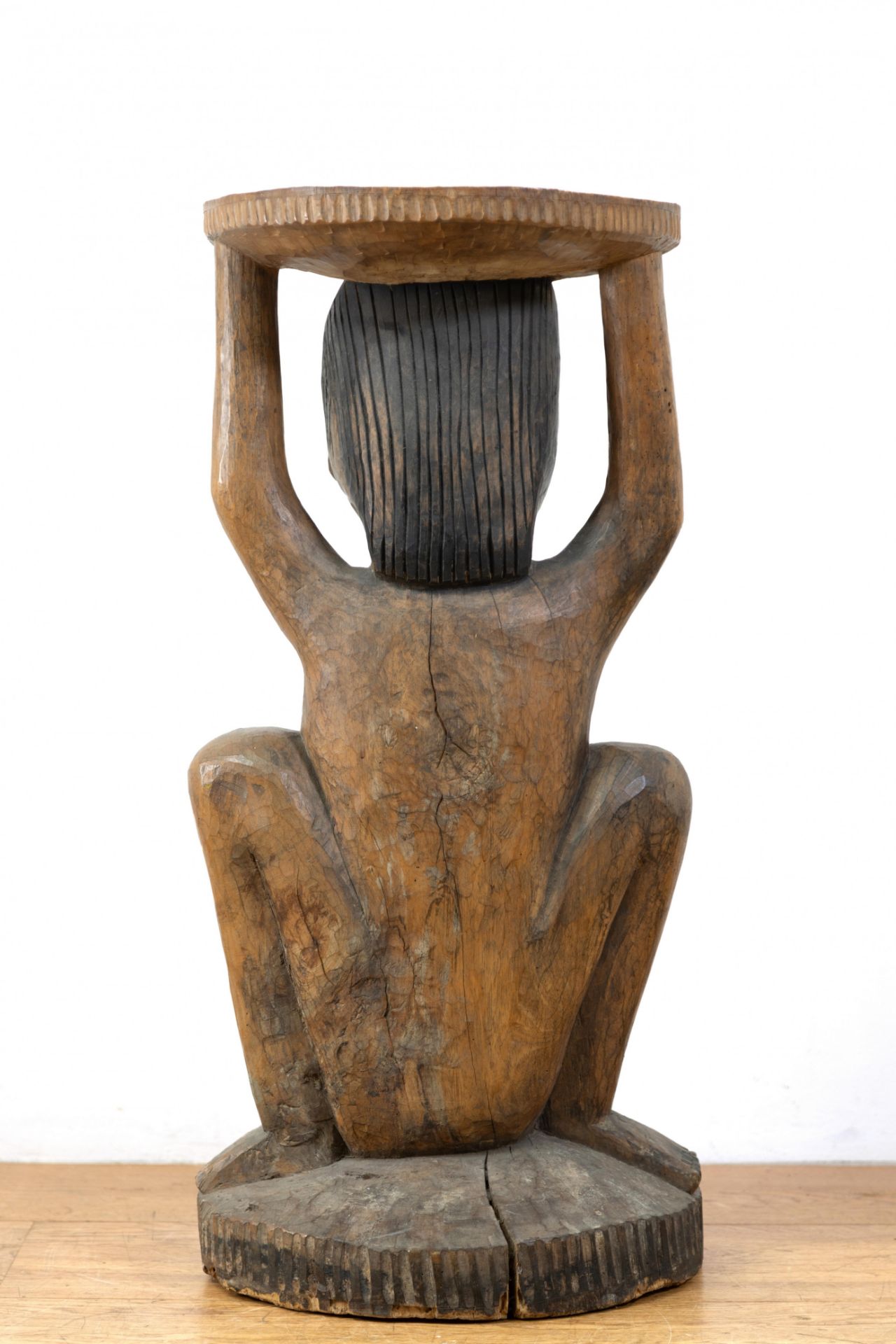 Indonesia, a large carved cariatide stool