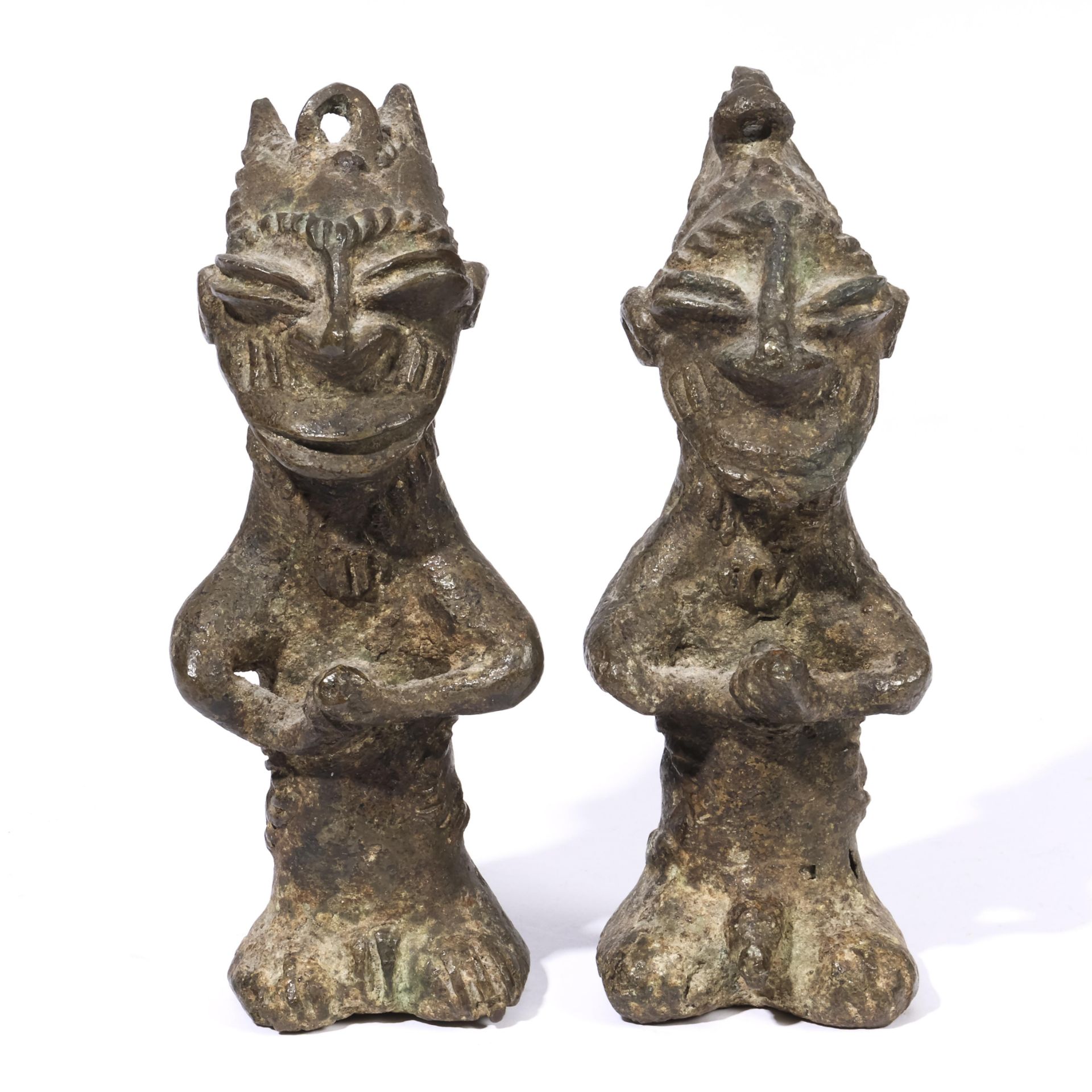 Nigeria, Yoruba, a pair of Ogboni Onile bronze figures,