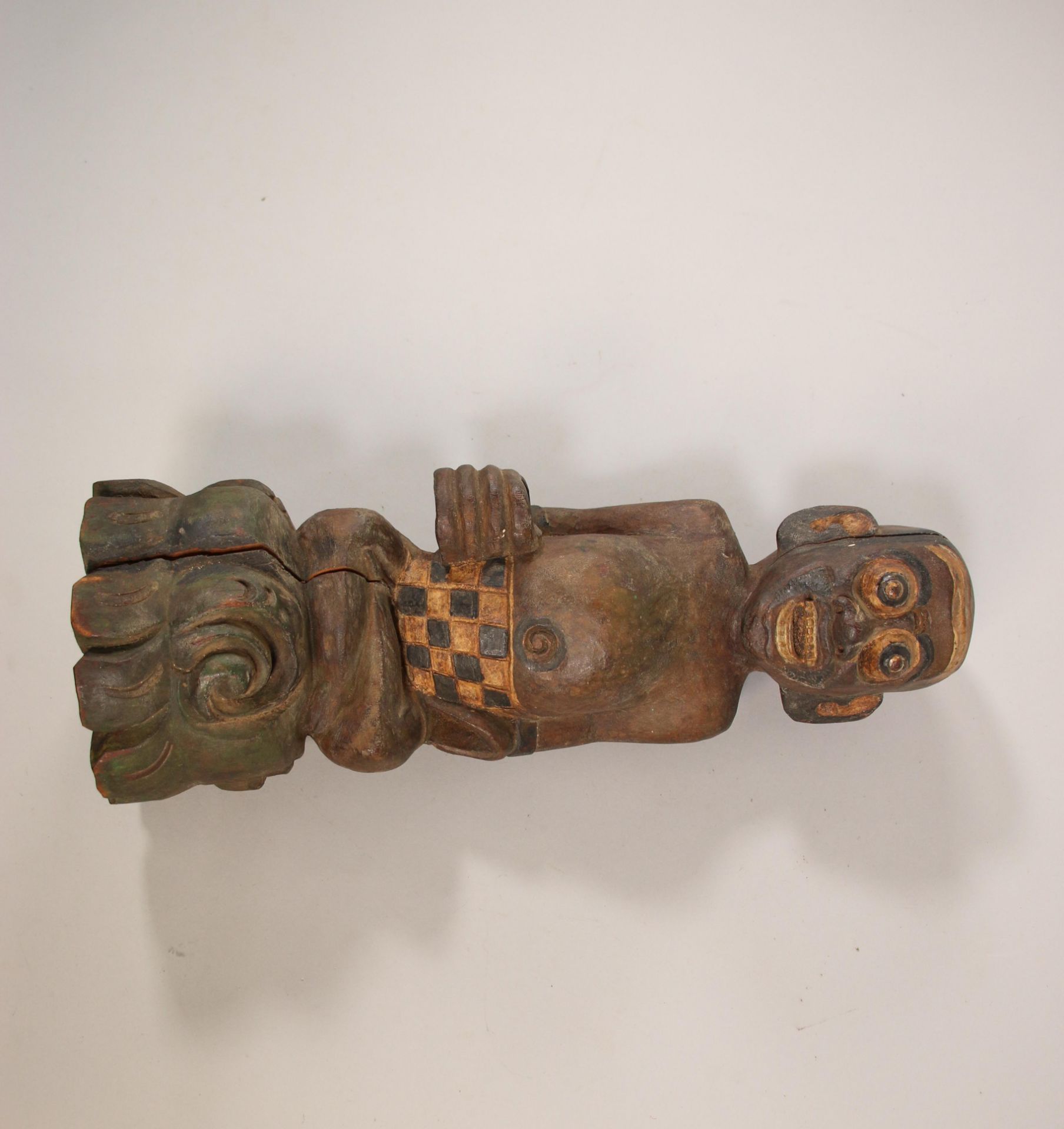 Bali, keris stand shaped as a demon figure.