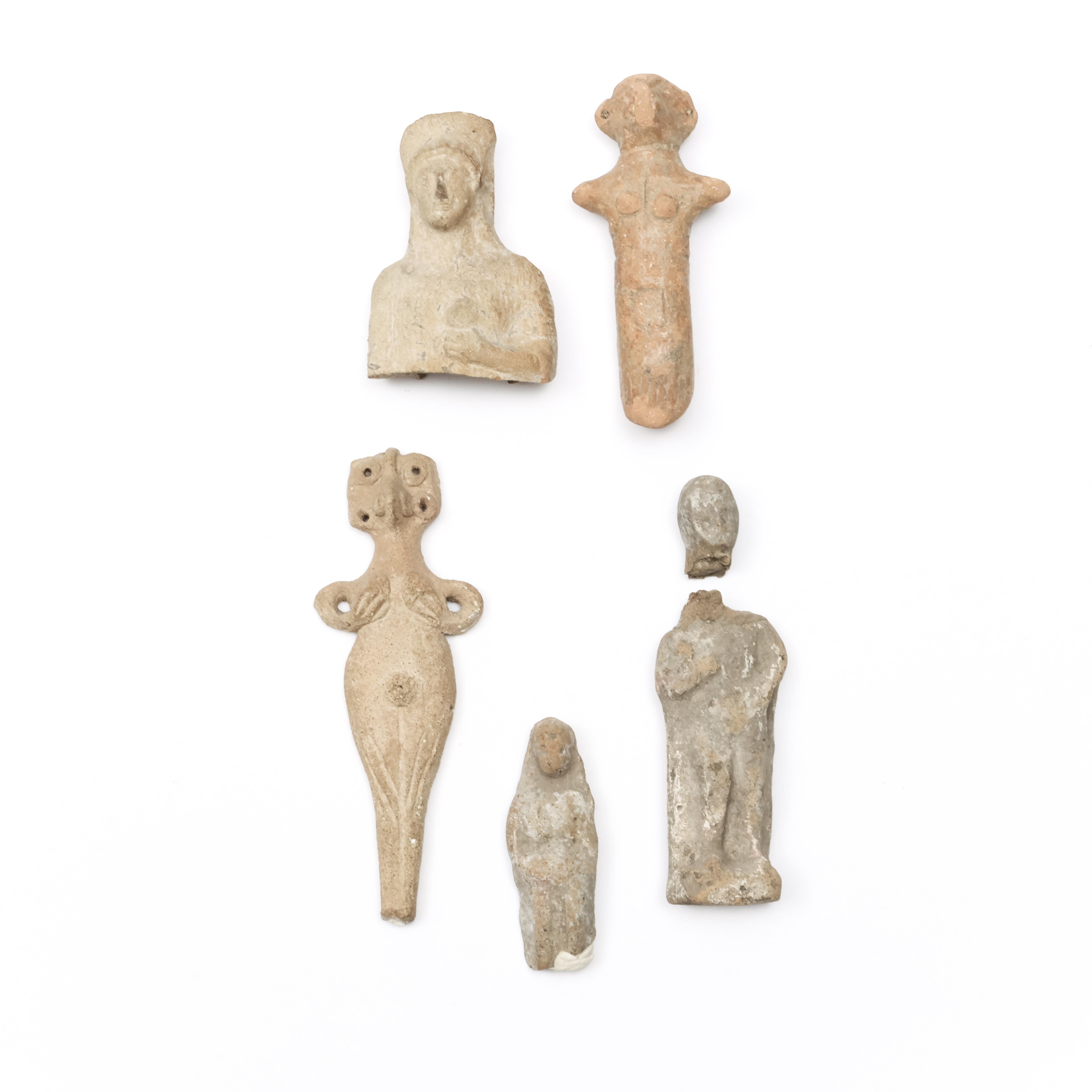 Five various terracotta figures;