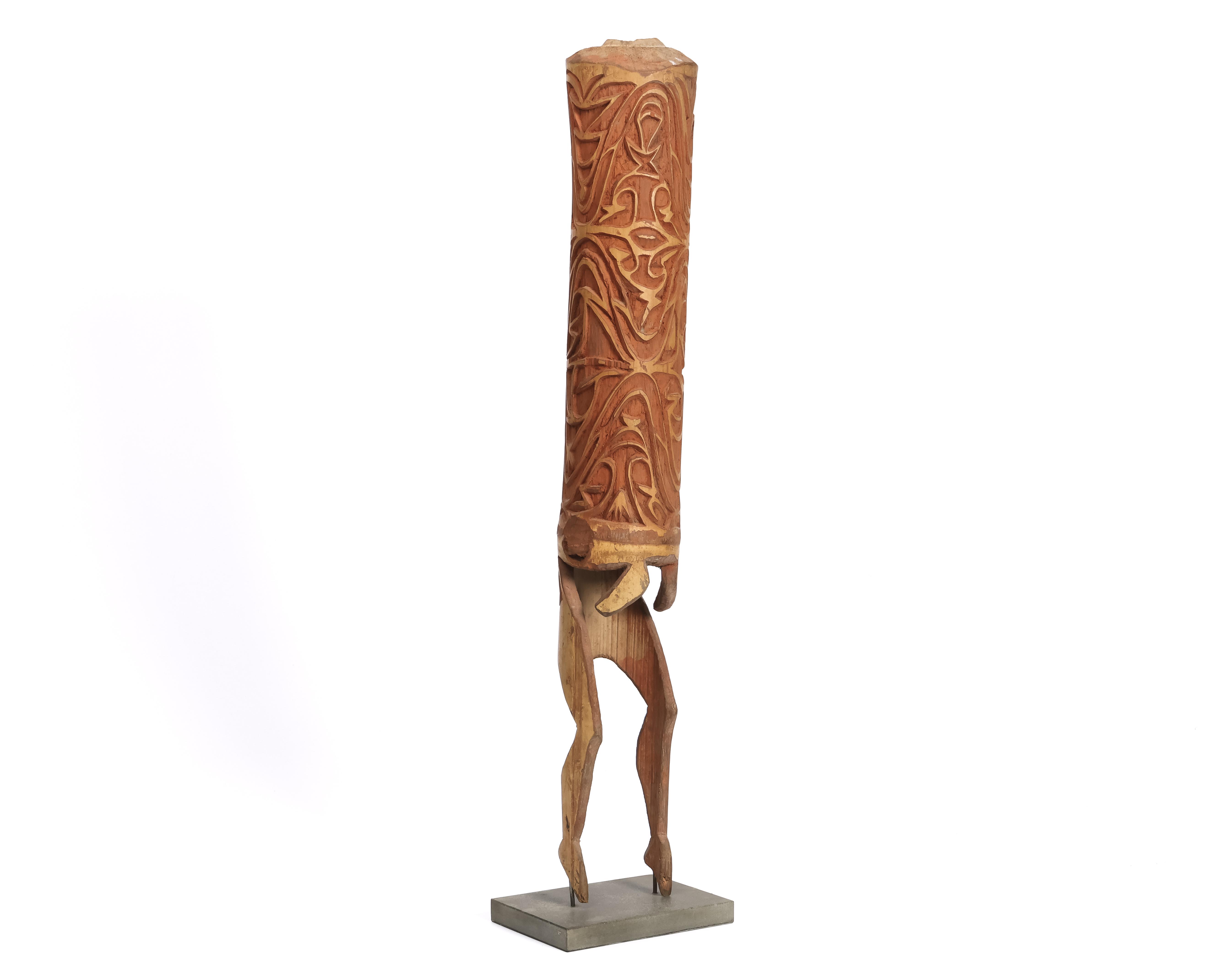 Papua, Asmat, bamboo horn, with two legs as extension.