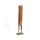 Papua, Asmat, bamboo horn, with two legs as extension.