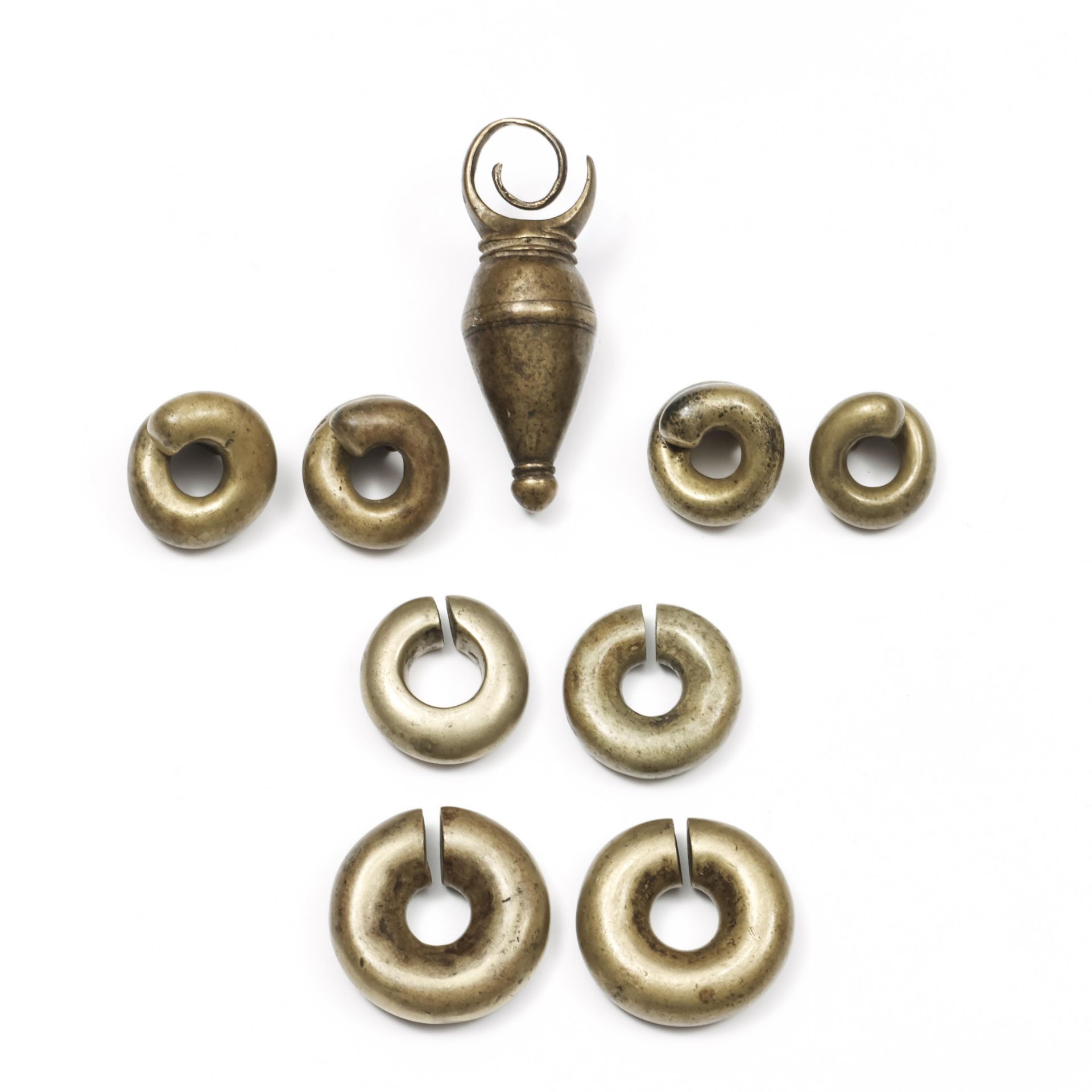 Borneo, Dayak, four pair of copper alloy ear pendants,