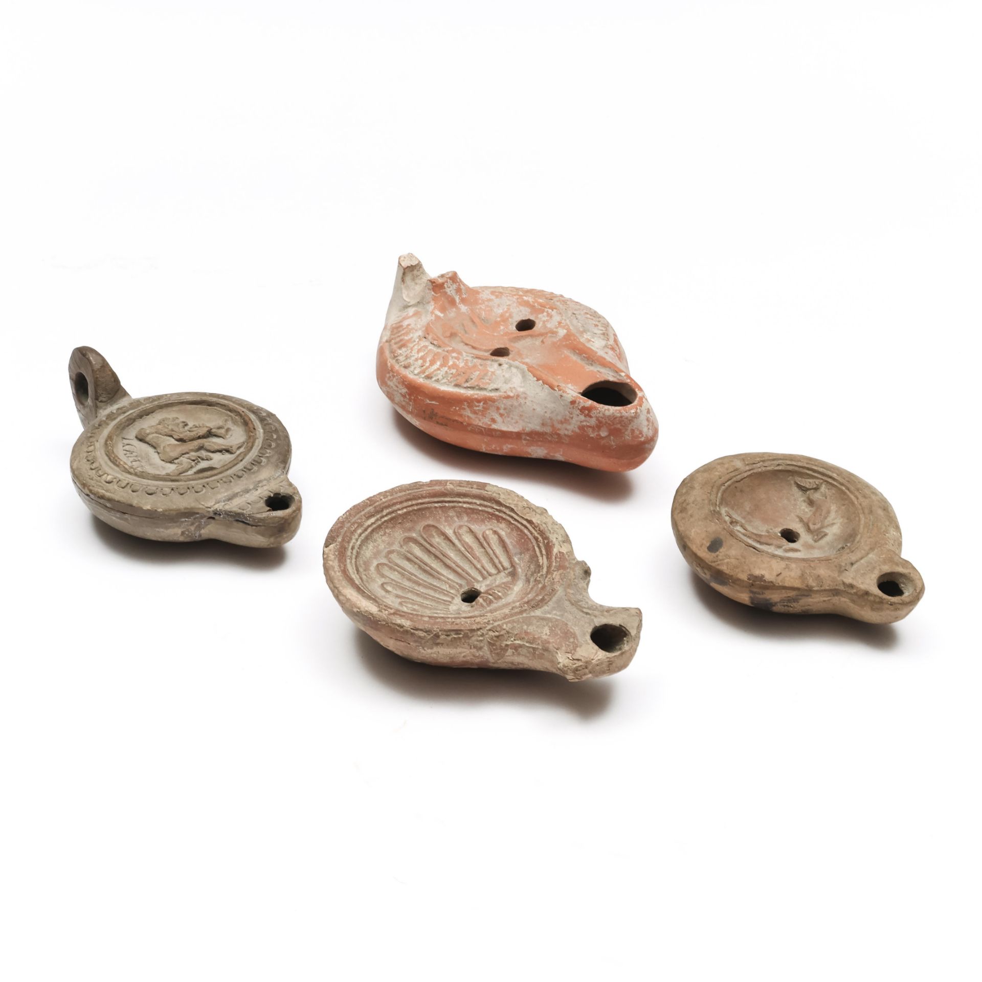 A collection of four Roman terracotta oillamps, ca. 2nd century AD, - Image 2 of 2