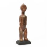 Ghana, Akan, a standing anthropomorphic figure.