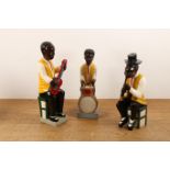 Ivory Coast, three Colon figures;