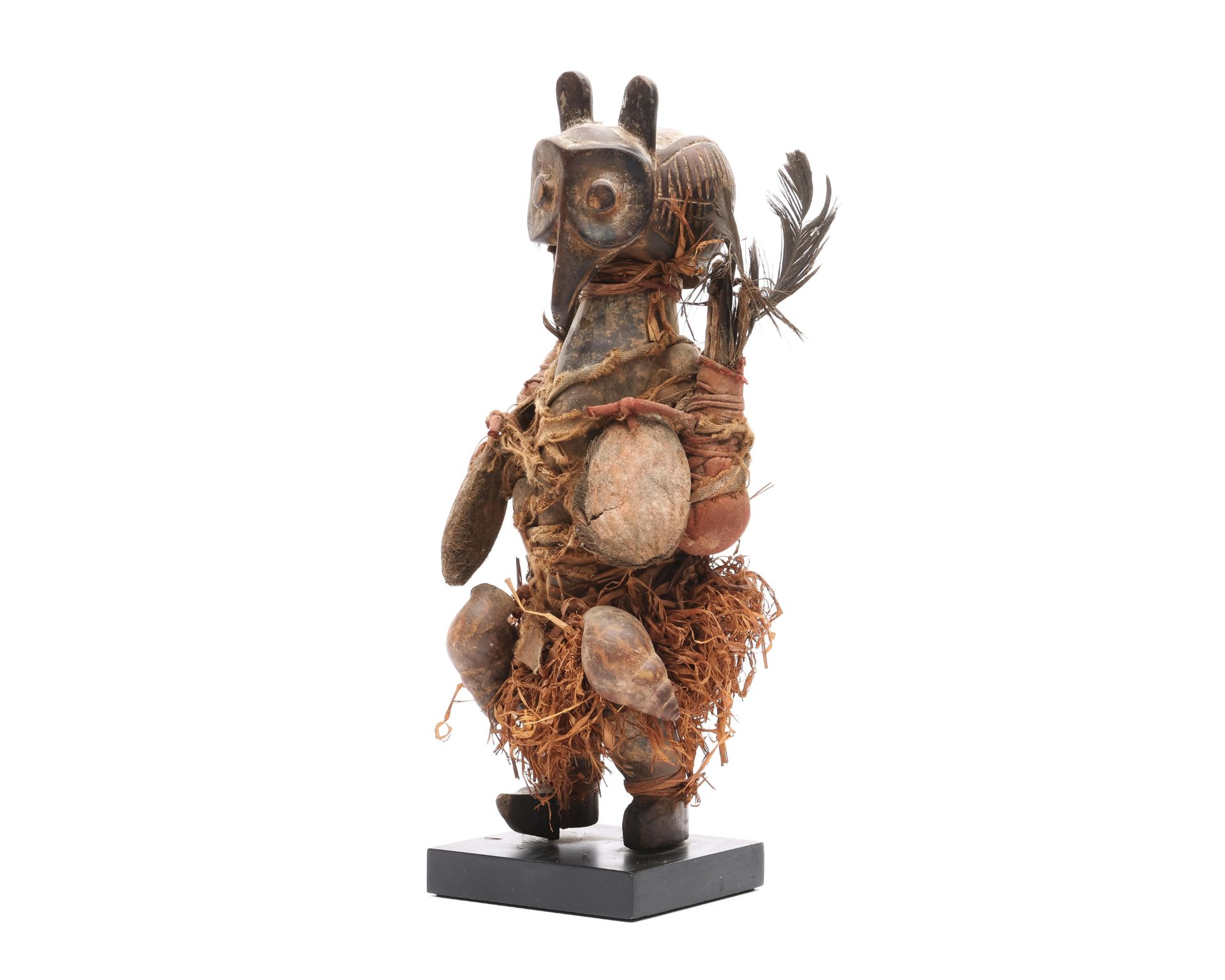 D.R. Congo, Yaka, power figure with a bird's head, cotton, feathers.