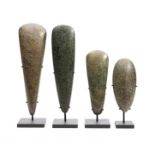 Papua, a collection of four stone axe blades