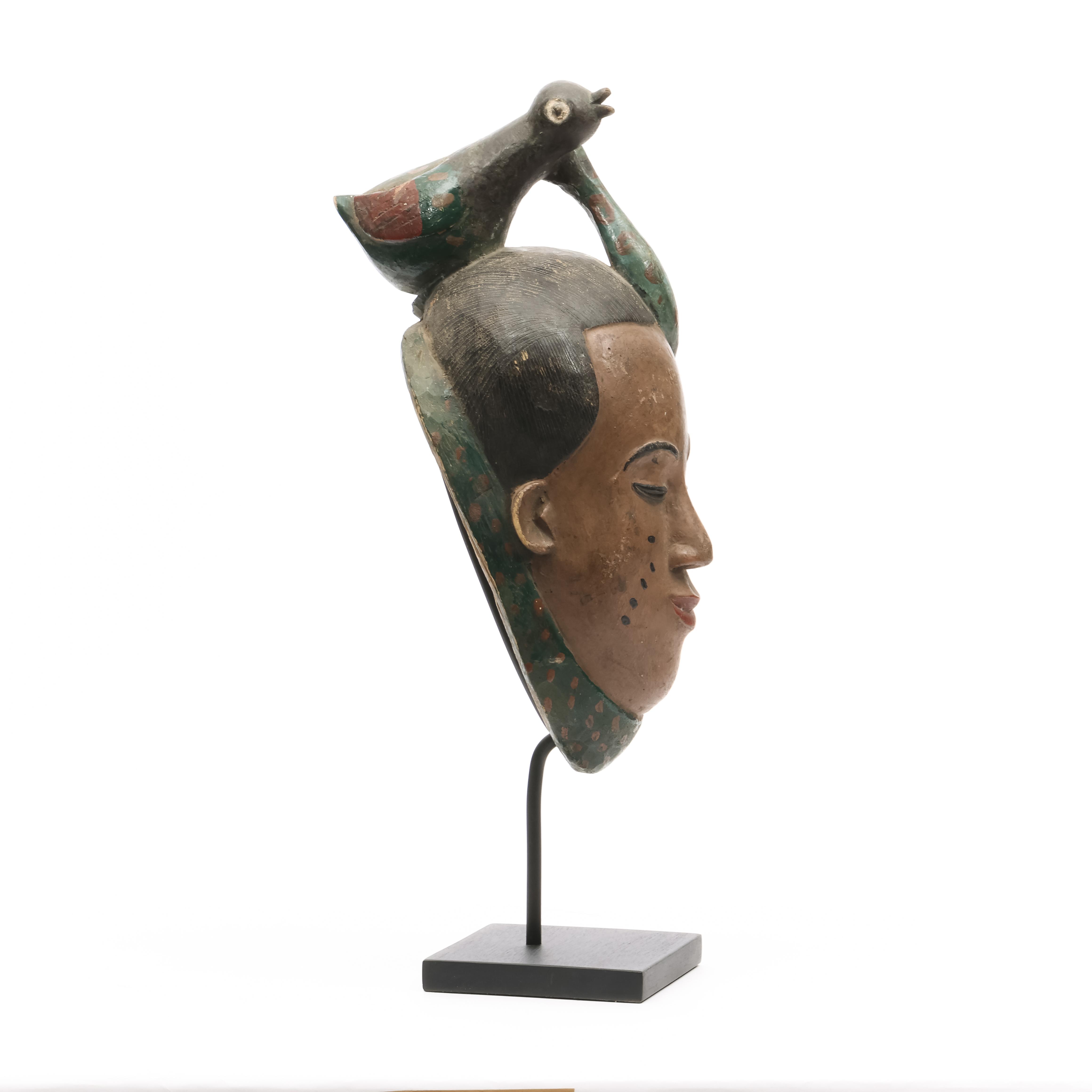 Ivory Coast, Guro, anthropmorphic head surmounted by a bird attacked by snake. - Image 2 of 4