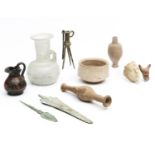 A collection of various Archological objects;