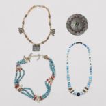 Afghanistan-India, three beaded necklaces and a silver alloy disk shaped pendant.