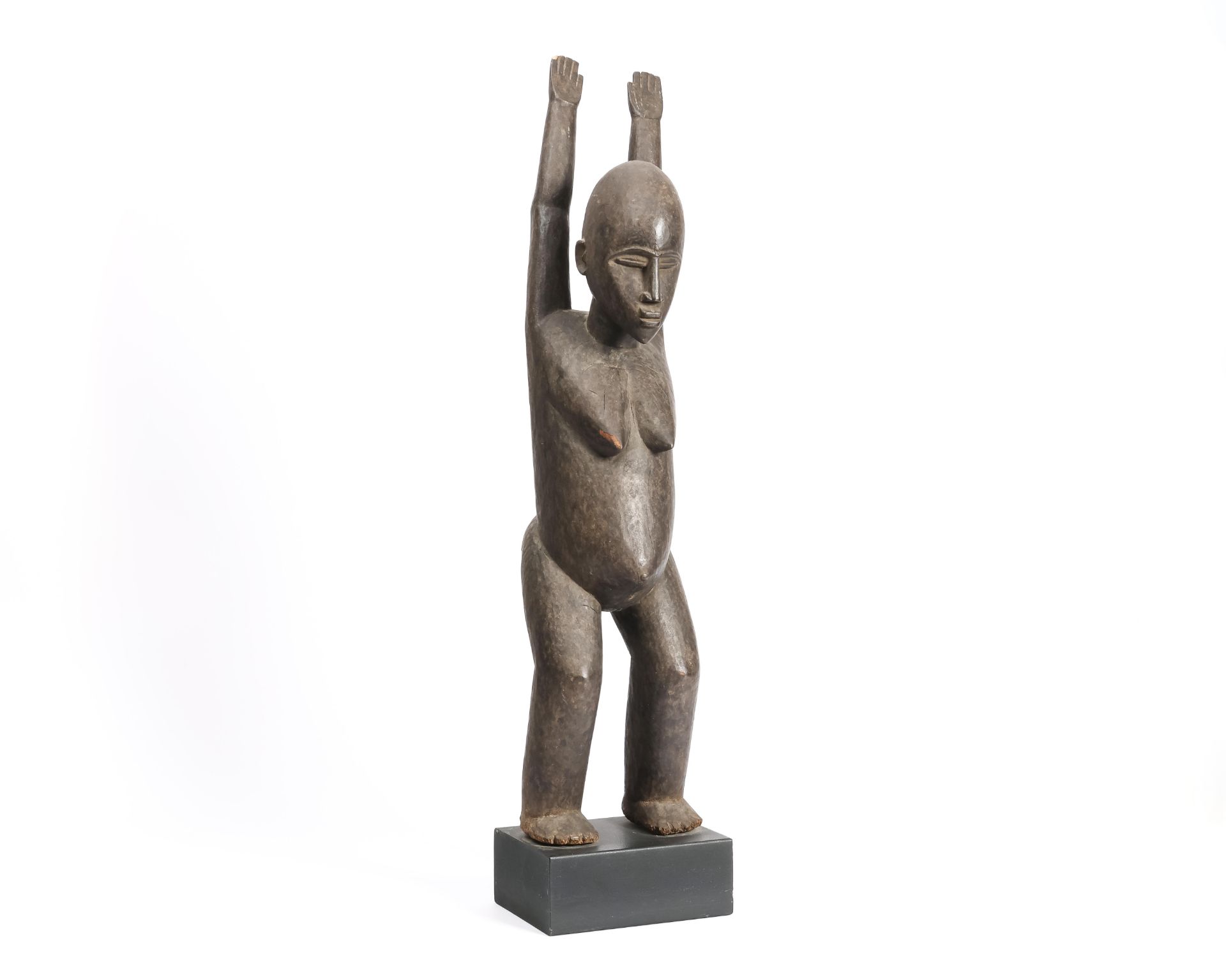 Burkina Faso, Lobi, standing female figure with arms raised.