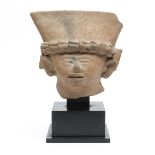 Mexico, Vera Cruz, a terracotta smiling figure head, 600-900 AD