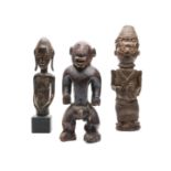 Africa, an assorted lot of three various figures.