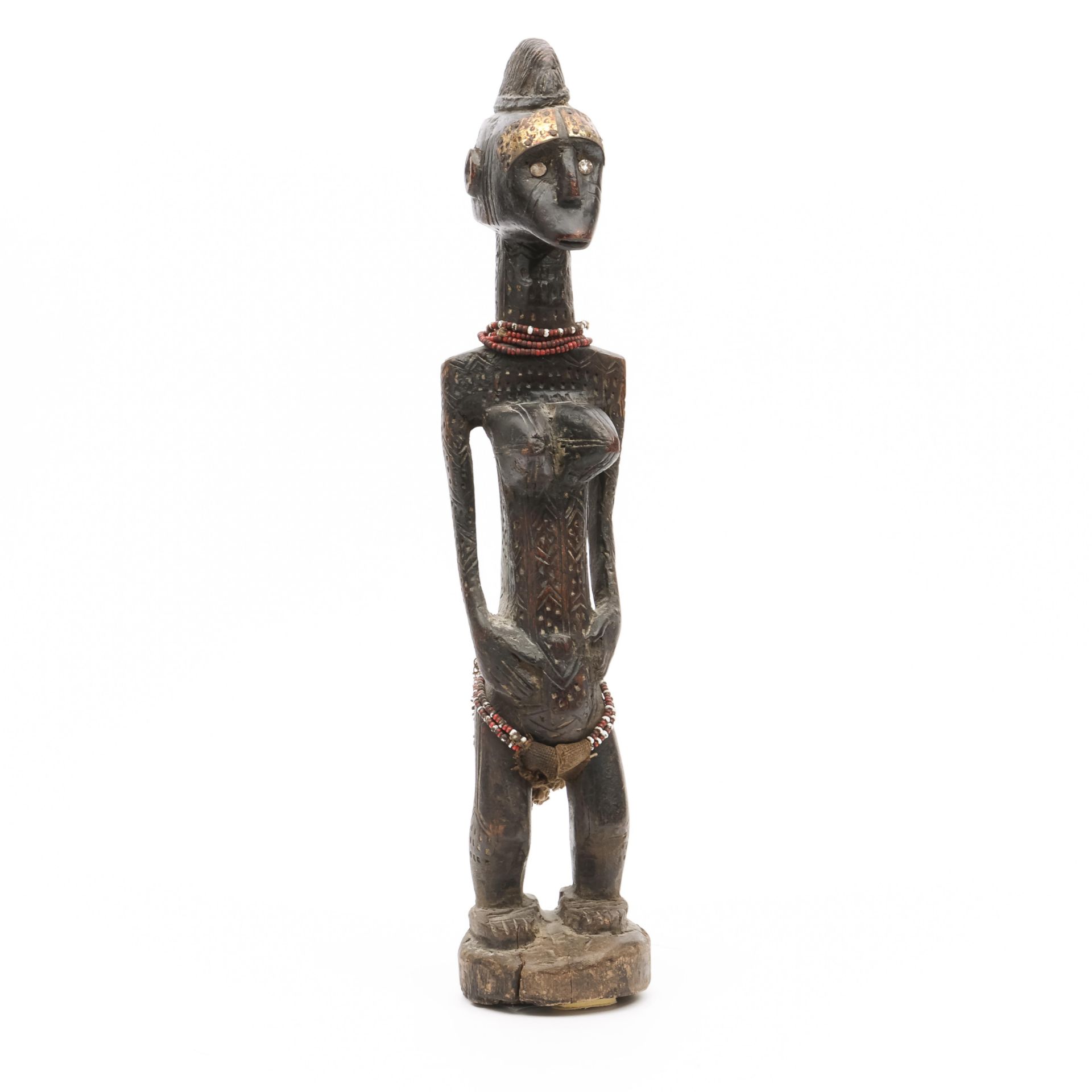 A standing female figure in Bambara style.