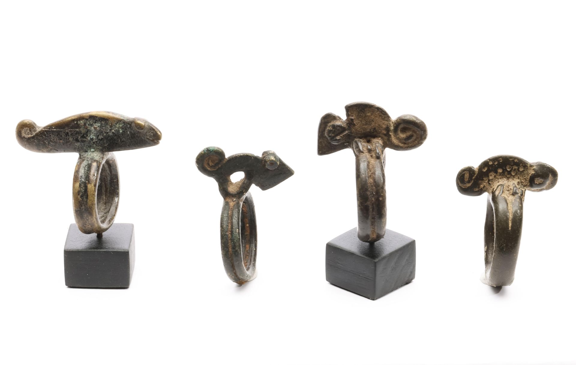 Burkina Faso, Lobi, four copper alloy rings - Image 3 of 3