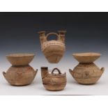 Greece, two Daunian terracotta funnel kraters and two askos, 6th-5th century BC;