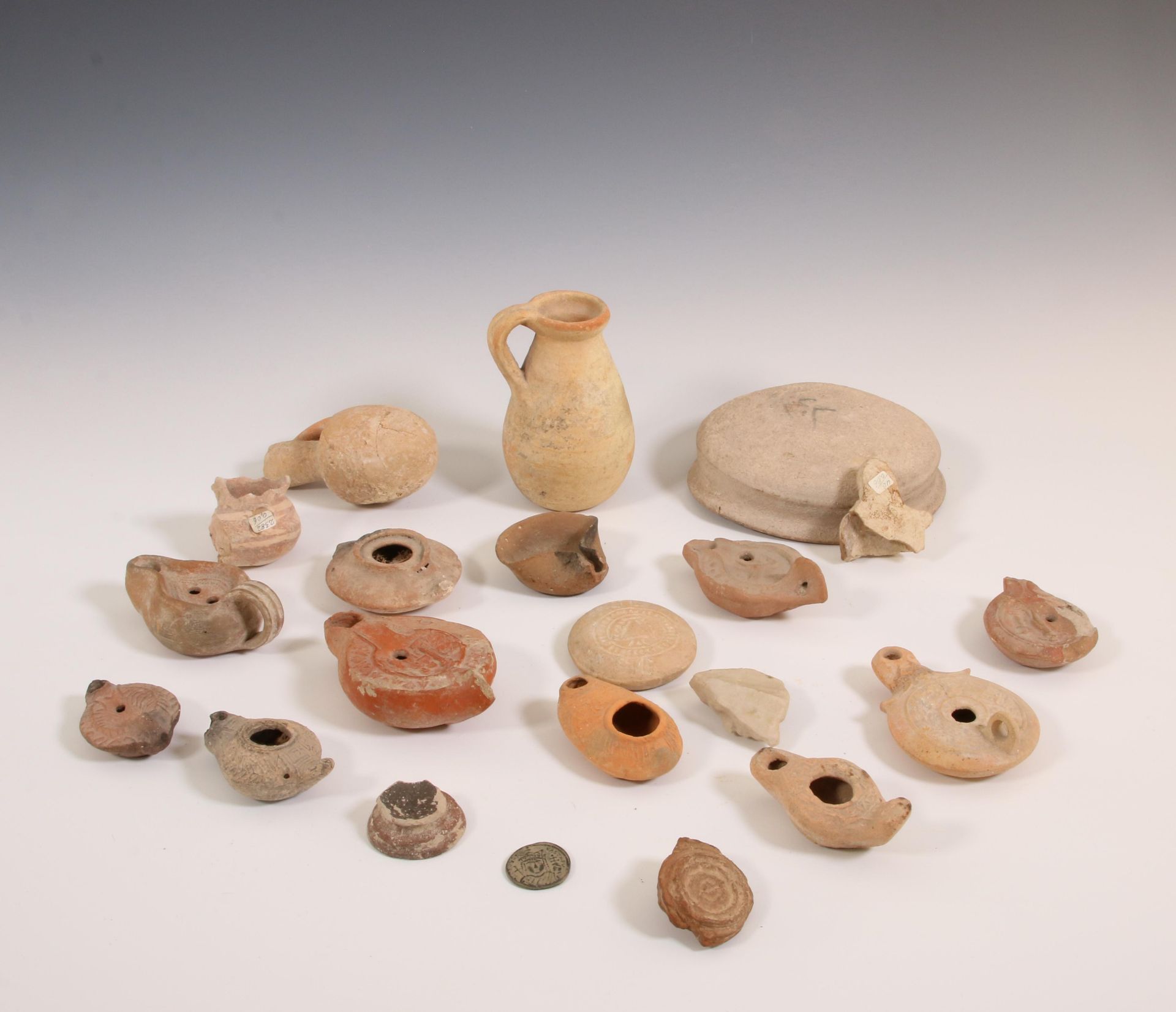 A collection of Roman terracotta oil lamps, two bottles and a bowl, ca. 2nd century AD; - Image 2 of 2