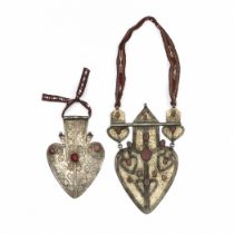 Turkmenistan, Tekke, a silver and ormolu heart-shaped back pendant, asik, set with cornelian, woven