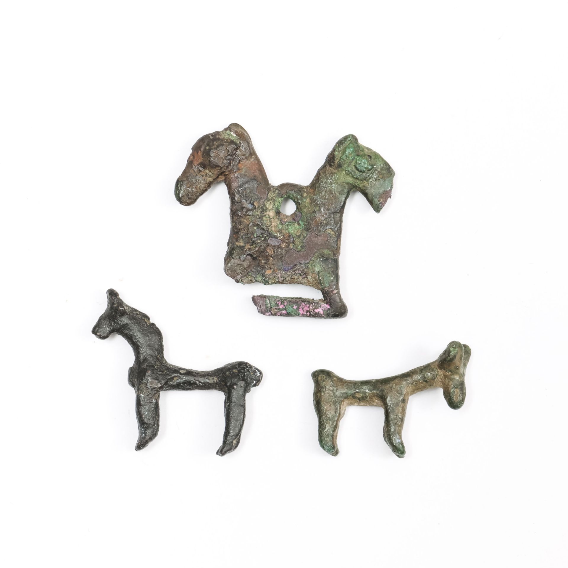 Wester Iran, three bronze small horse statues-amulets, ca. 1000-600 BC.