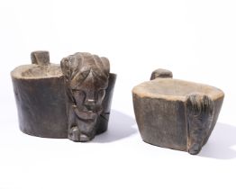 Sumatra, Batak, two wooden mortars, showing a singa head to one side a tail to the other.