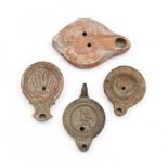 A collection of four Roman terracotta oillamps, ca. 2nd century AD,