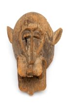 Ivory Coast, Senufo, a weathered old helmet mask,