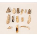 A collection of stone and bone objects, some Taino from ca. 1000-1500 AD;