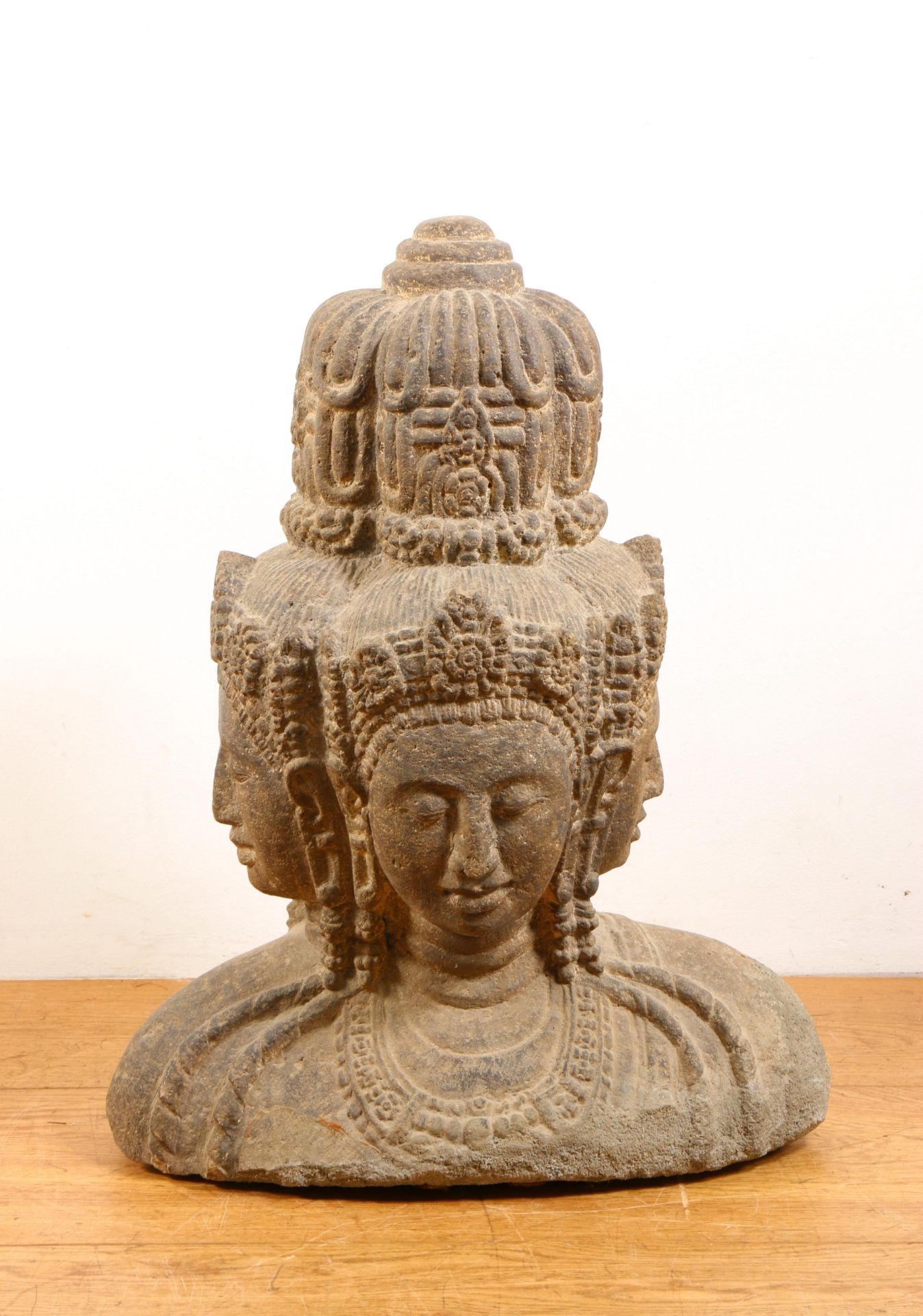 India, a carved stone statue of a four faced Brahma, 20th century