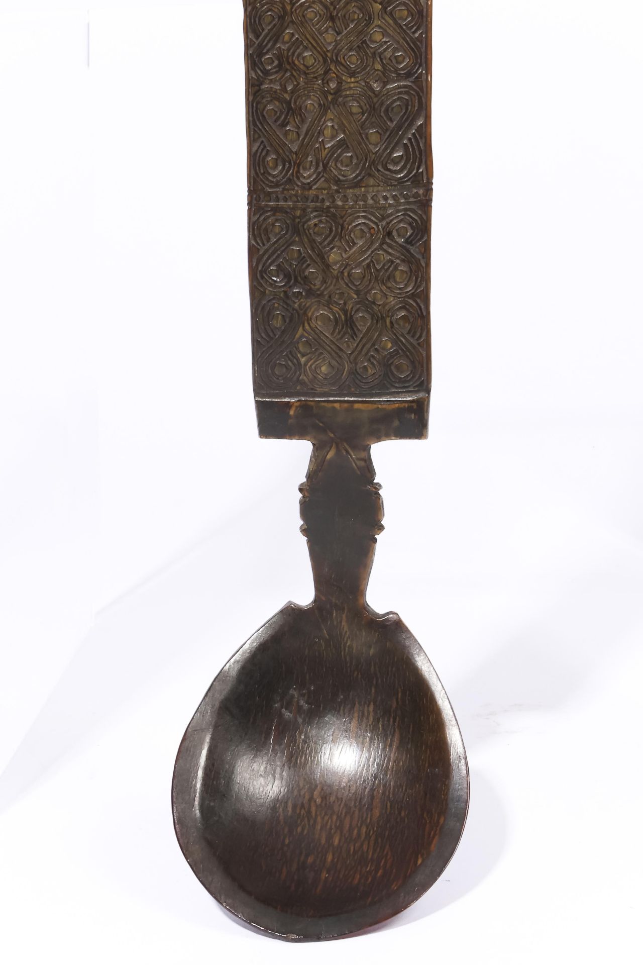 Timor, horn spoon, the rectangular handle carved with spirals and knots. - Image 2 of 4