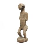 West Africa, zoomorphic-anthropomorphic standing ritual figure.