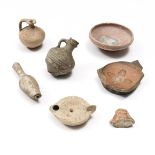 A collection of five Roman terracotta objects-fragments, 2nd-3rd century AD;