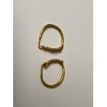 A pair of 22kt. gold hoop ear rings, possibly Roman, 2nd Century,